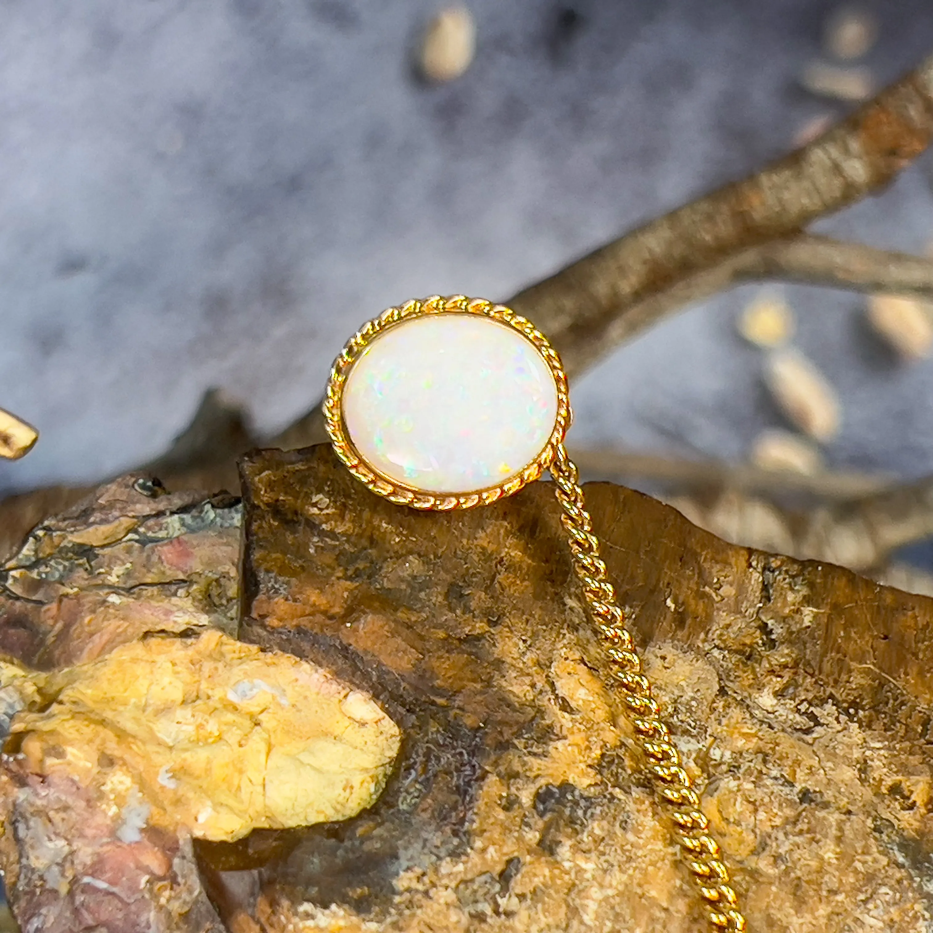 18kt Tie pin 12x10mm White Opal bezel