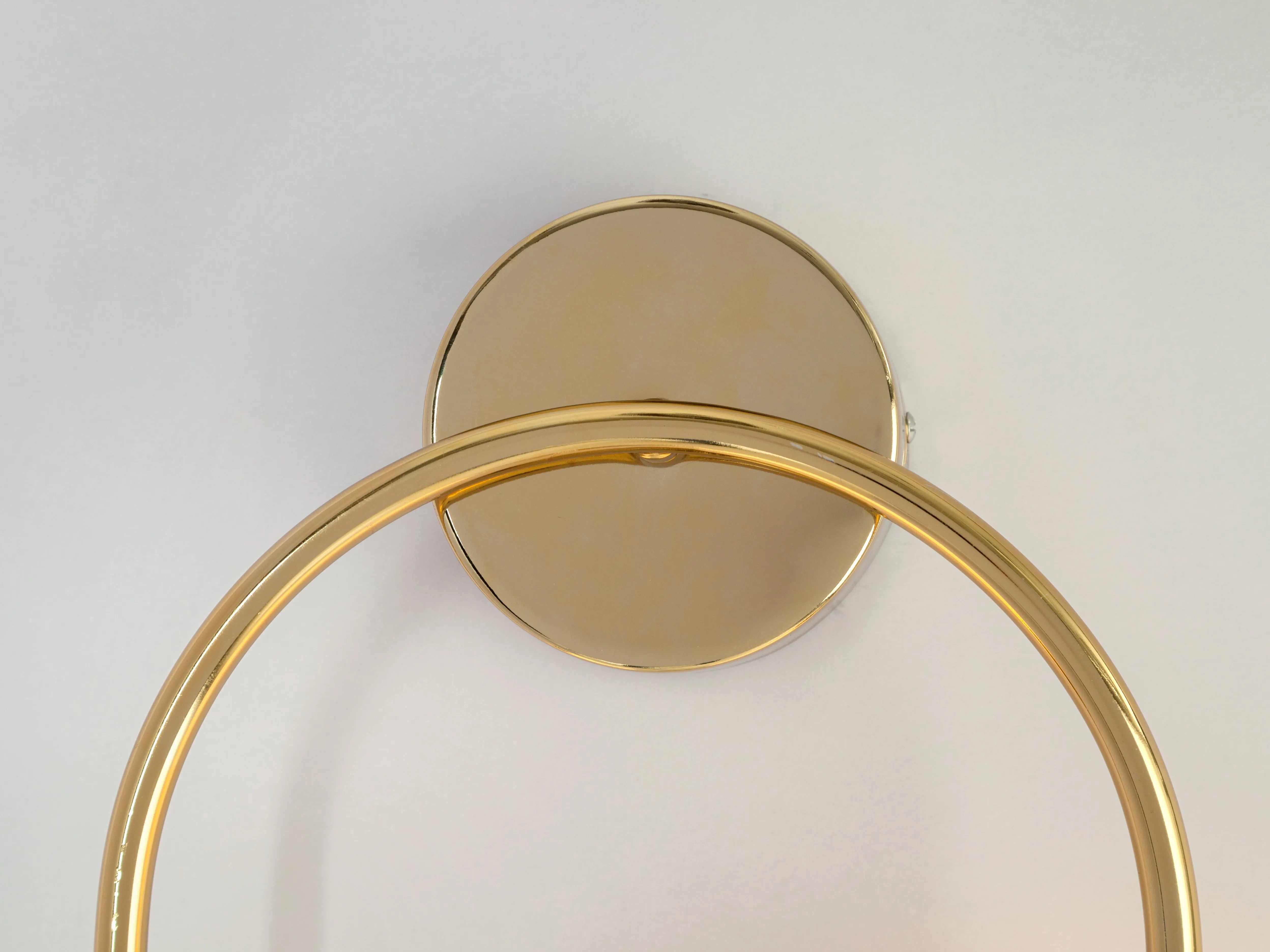 Brass oval pill wall light